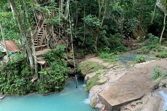 Blue Hole & Dunns River Falls With Lunch From Negril - Exploring Cascades and Caves