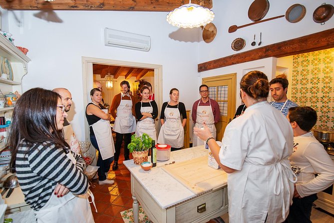 Cesarine: Market Tour & Cooking Class at Locals Home in Lucca - Meal Pairing With Italian Wines