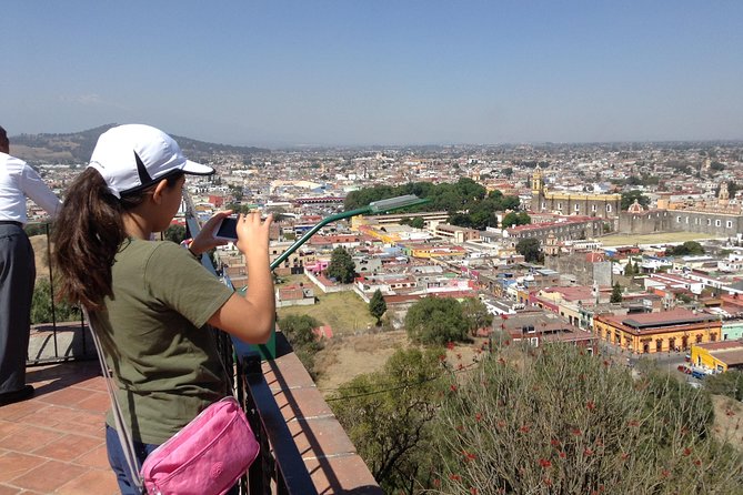 Cholula Magical Twon on a Traditional Tram From Puebla - Tram Experience and Audio Tour