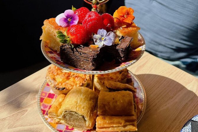 Delightful Scottish Afternoon Tea Experience in Edinburgh - Hospitable Host Greeting Guests