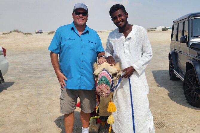 Desert Safari With Sandboarding and Inland Sea Private Tour - Exhilarating Sandboarding