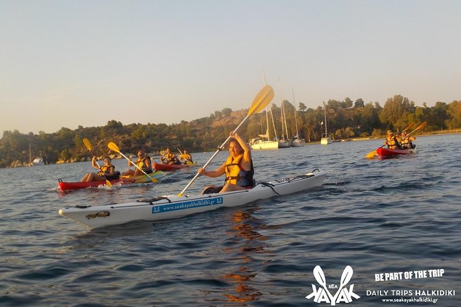 Vourvourou Sunset Sea Kayak Trip - Snorkeling and Fruit