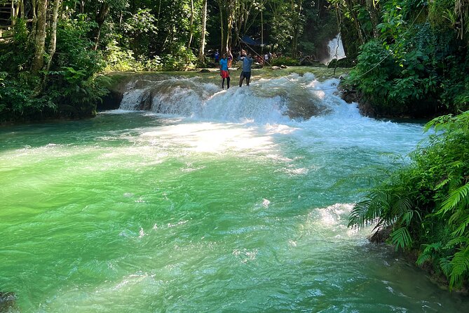 Blue Hole Waterfalls and Bamboo Rafting With Transportation - Exploring Blue Hole Waterfalls