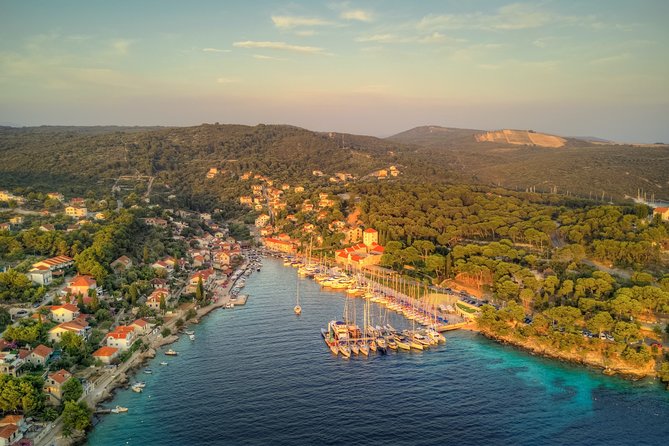 Blue Lagoon & Maslinica Half Day Tour From Trogir - Scenic Boat Ride