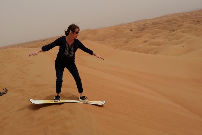 Private Desert Safari With Sand Boarding Quad Bike and Camel Ride BBQ Dinner - Dining Under the Stars