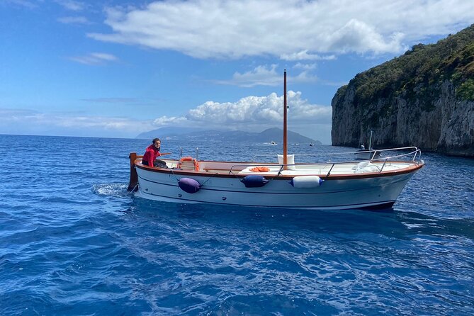 2 Hours Guided Sunset Tour of the Island of Capri With Aperitif - The Sum Up