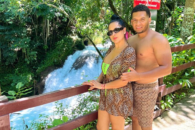 Blue Hole Waterfalls and Bamboo Rafting With Transportation - Bamboo Rafting Experience
