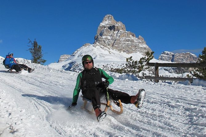 From Bolzano - Snowmobile + Sledding and The Great Dolomites Road Private Tour - Thrilling Snowmobiling Adventures