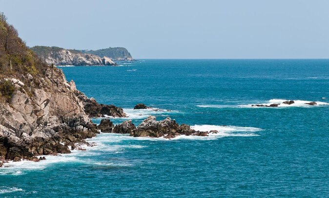 Bays of Huatulco and Snorkeling Experience With Drinks - Key Points