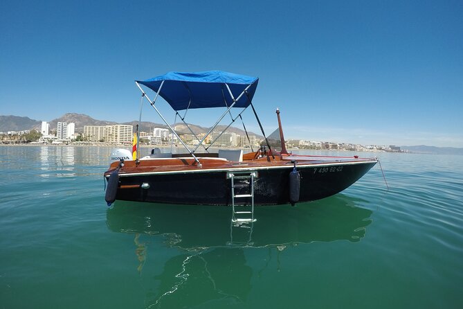 Classic Runabout Boat Rental in Santander Bay