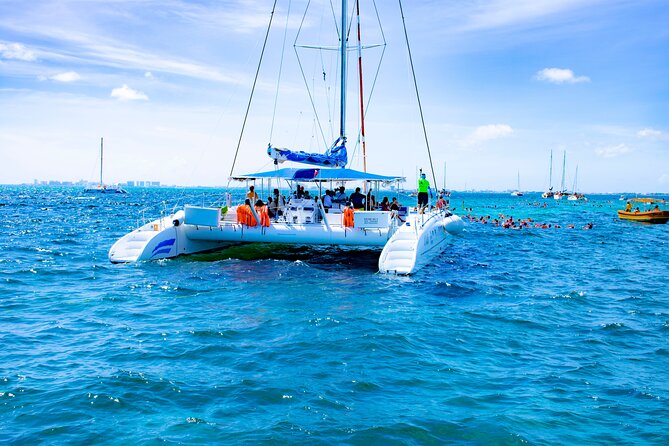 Isla Mujeres Tour on Catamaran With Snorkel, Open Bar, Buffet & Beach Club