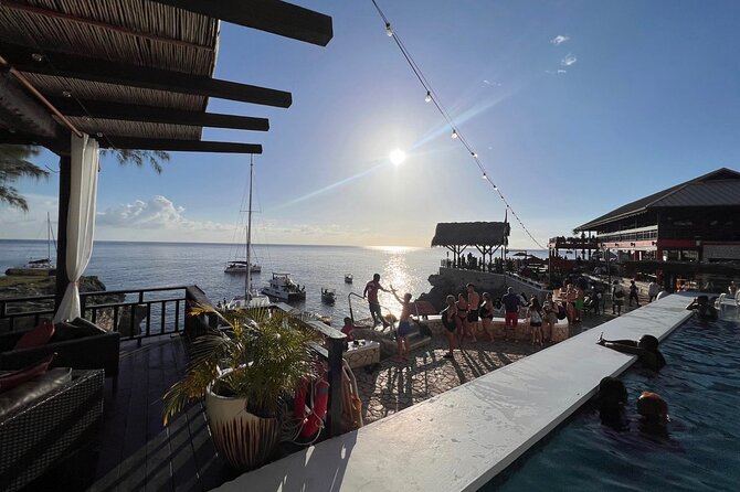Negril 7 Mile Beach, Party Catamaran Cruise and Ricks Cafe Combo - Overview of the Experience