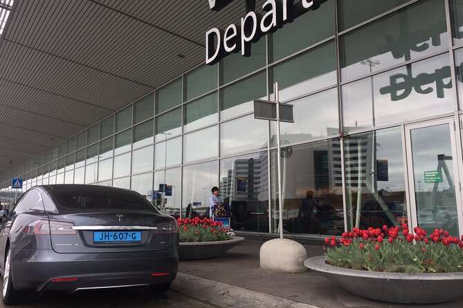 Private Tesla Taxi From Delft to Schiphol Amsterdam Airport