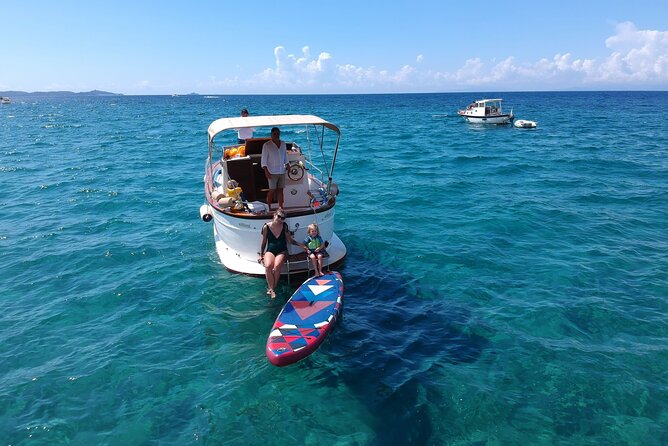 Half Day Private Boat Tour to Cala Violina - Inclusions and Amenities