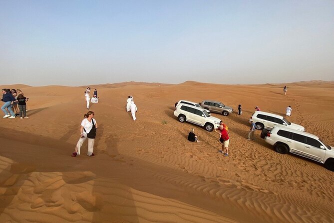 Morning Desert Safari With Dune Bashing, Camel Ride, Sand Board & Quad Biking - Enjoy a Camel Ride