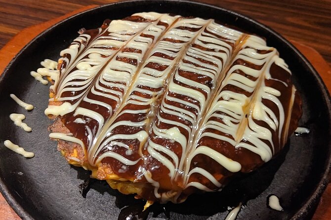 Osaka Private Food Tour Eat Like a Local in Osaka - Indulge in Osakas Iconic Street Food