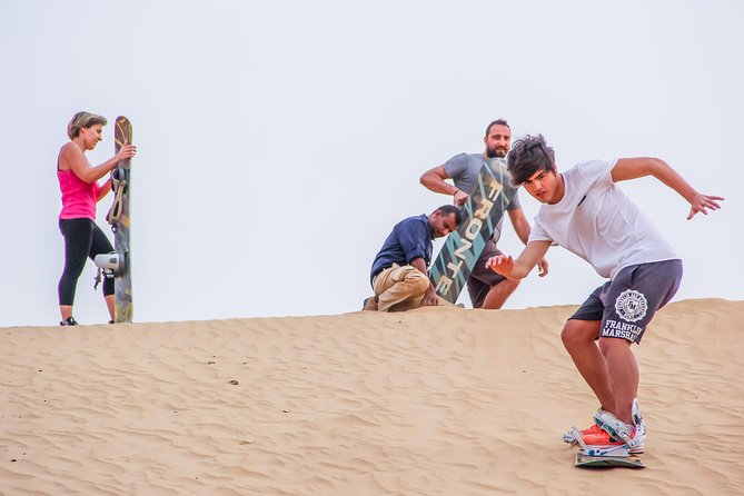 Private Overnight Safari: Sandboarding, Camel Ride, BBQ Dinner and Belly Dancing - Detailed Itinerary