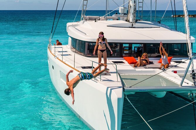 Catamaran Tour to Isla Mujeres From Cancún With Bar and Lunch - Experience Highlights on the Tour