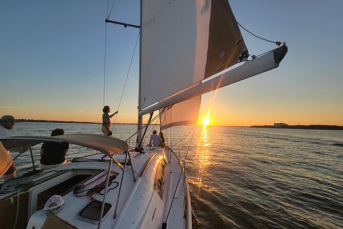 Private Sunset Sailing With Dolphin and History Tours on Mystique - Boat and Amenities Aboard the Mystique