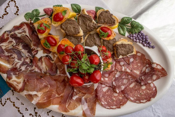 Lunch or Dinner and Cooking Demo at a Local Home in Foligno - Pricing and Cancellation Policy