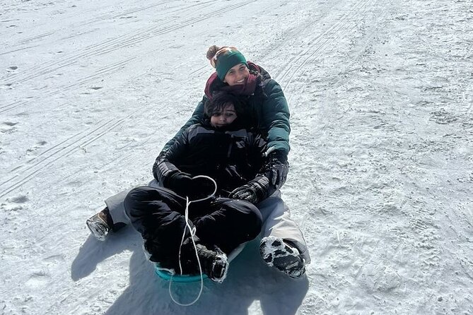 Private Winter Tour + Sledding in Rocky Mountain National Park - Sledding Fun for Everyone