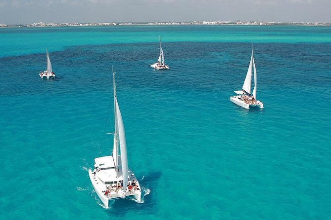Catamaran Adventure to Isla Mujeres With Snorkel,Buffet,Open Bar and Beach Club - Important Tour Information