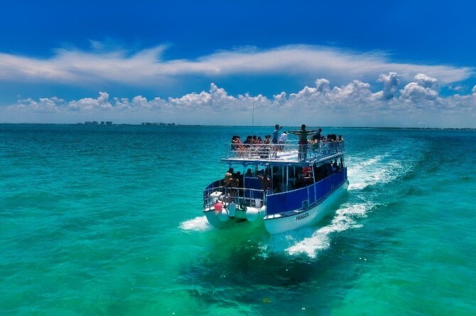 Discovering Isla Mujeres on a Double Decker Catamaran - Booking Tips and Considerations