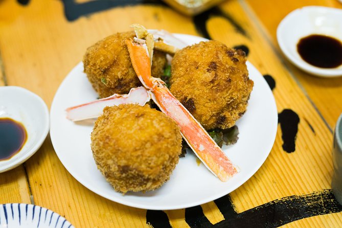 Experience Izakaya With A Mini Food Tour Of Tokyo - Indulging in a Variety of Snacks and Tapas-Style Dishes