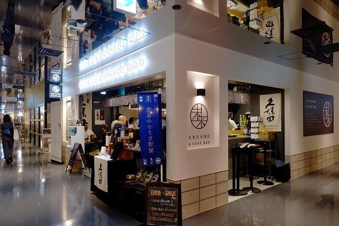 Japanese Sake & AI Experience Plan at Kubota Sake Bar - Booking and Cancellation Policy