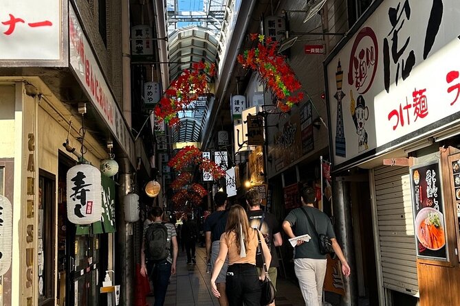 Osaka Flavors A Family Friendly Kuromon Market Half Day Tour - Exploring Kuromon Market
