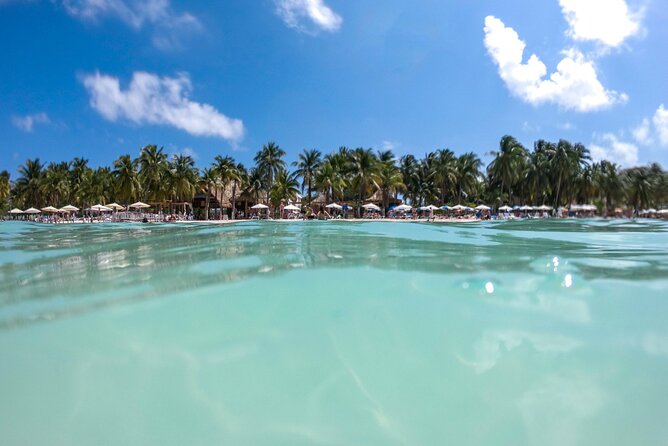 Isla Mujeres Tour on Catamaran With Snorkel, Open Bar, Buffet & Beach Club - Host Responses and Clarifications