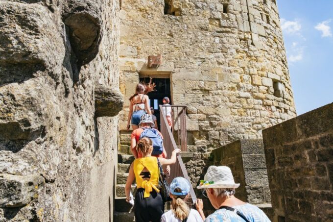 Toulouse: Carcassonne Day Trip by Coach With Comtal Castel - Transportation and Departure