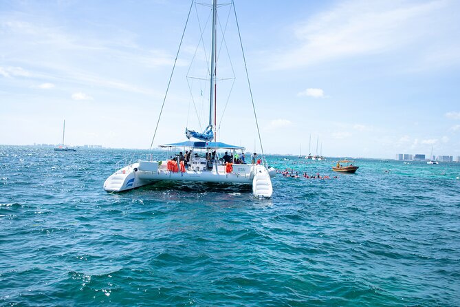 Isla Mujeres Tour on Catamaran With Snorkel, Open Bar, Buffet & Beach Club - Tips for a Great Experience