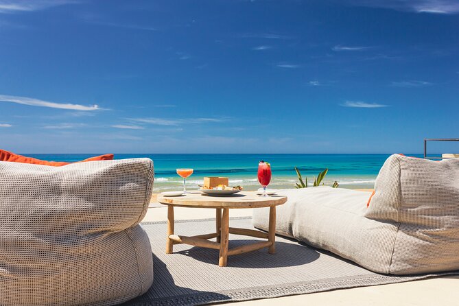 Full Day Pass to Cala Manbrù Beach Club - Key Points