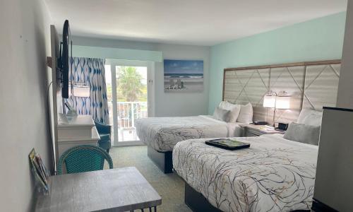 Ocean Sands Beach Boutique Inn-1 Acre Private Beach-St Augustine Historic-2 Miles-Shuttle With Downtown Tour-Heated Salt Water Pool Until 4am-Popcorn-Cookies-New 4k USD Black Beds-35 Item Breakfast-Eggs-Bacon-Starbucks-Free Guest Laundry-Ph#904-799-Sand - Hotel Overview