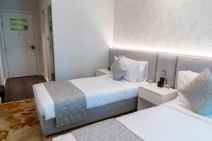 Estay Hotel - Accommodation and Amenities