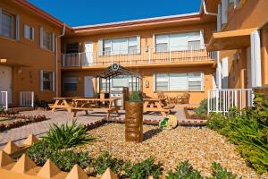 Riptide Oceanfront Hotel - Policies and Check-In/Out