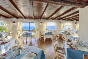 COLONNA GRAND HOTEL CAPO TESTA, a Colonna Luxury Beach Hotel, Santa Teresa Sardinia - Dining Experience