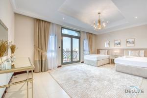 Immaculate 4BR Villa With Assistant Room and Private Pool at Frond O Palm Jumeirah by Deluxe Holiday Homes - Convenient Property Location