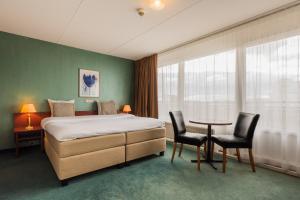 Prominent Inn Hotel - Room Types and Features