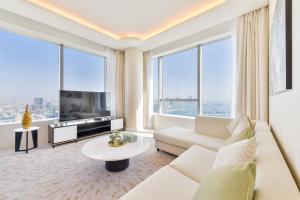 Ultra Luxury Palm Tower With Shared 5 Star Hotel Facilities - Company Background and Contact Information