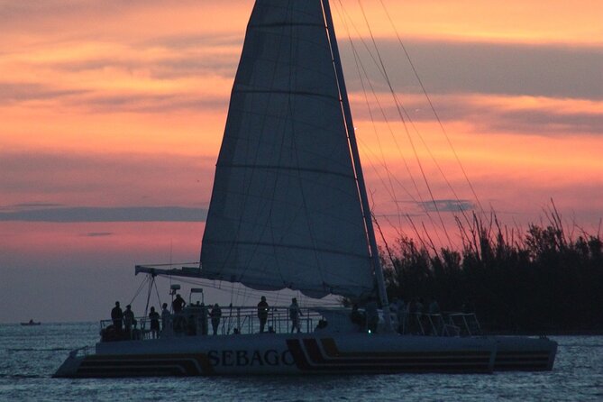Key West: Smathers Beach & Activities With a Sunset Catamaran & Open Bar - Roundtrip Transportation