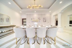 Signature 6BR Villa With Assistant Room and Private Pool in Frond F Palm Jumeirah by Deluxe Holiday Homes - Policies and Procedures