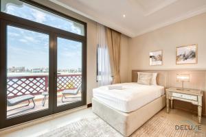 Immaculate 4BR Villa With Assistant Room and Private Pool at Frond O Palm Jumeirah by Deluxe Holiday Homes - Property Overview and Highlights