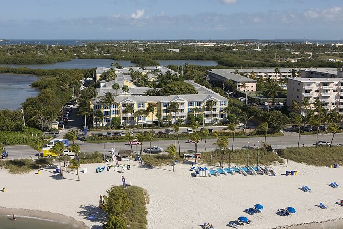 Key West: Smathers Beach & Activities With a Sunset Catamaran & Open Bar - Pricing and Booking Information