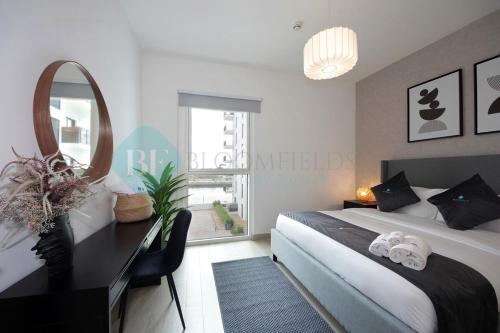 Bloomfields 1br Canal View In Waters Edge Yas - About Your Stay