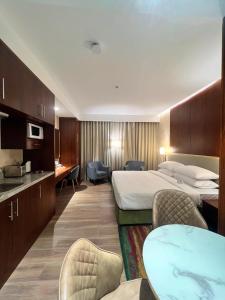 City Seasons Suites - About Your Stay