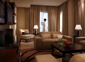 Shangri-La Hotel Apartments Qaryat Al Beri - About Your Stay