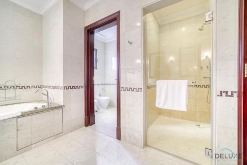 Signature 6BR Villa With Assistant Room and Private Pool in Frond F Palm Jumeirah by Deluxe Holiday Homes - About Your Stay