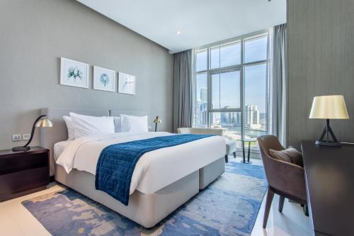 The S Holiday Homes Canal View Studio and One Bedroom Apartments, Damac Maison Prive - About Your Stay